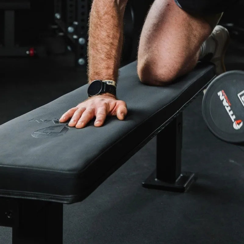 Titan Fitness Elite Series Single Post Flat Bench, 2.5" Thick HeftyGrip Vinyl Pad, Rated 1,000 LB
